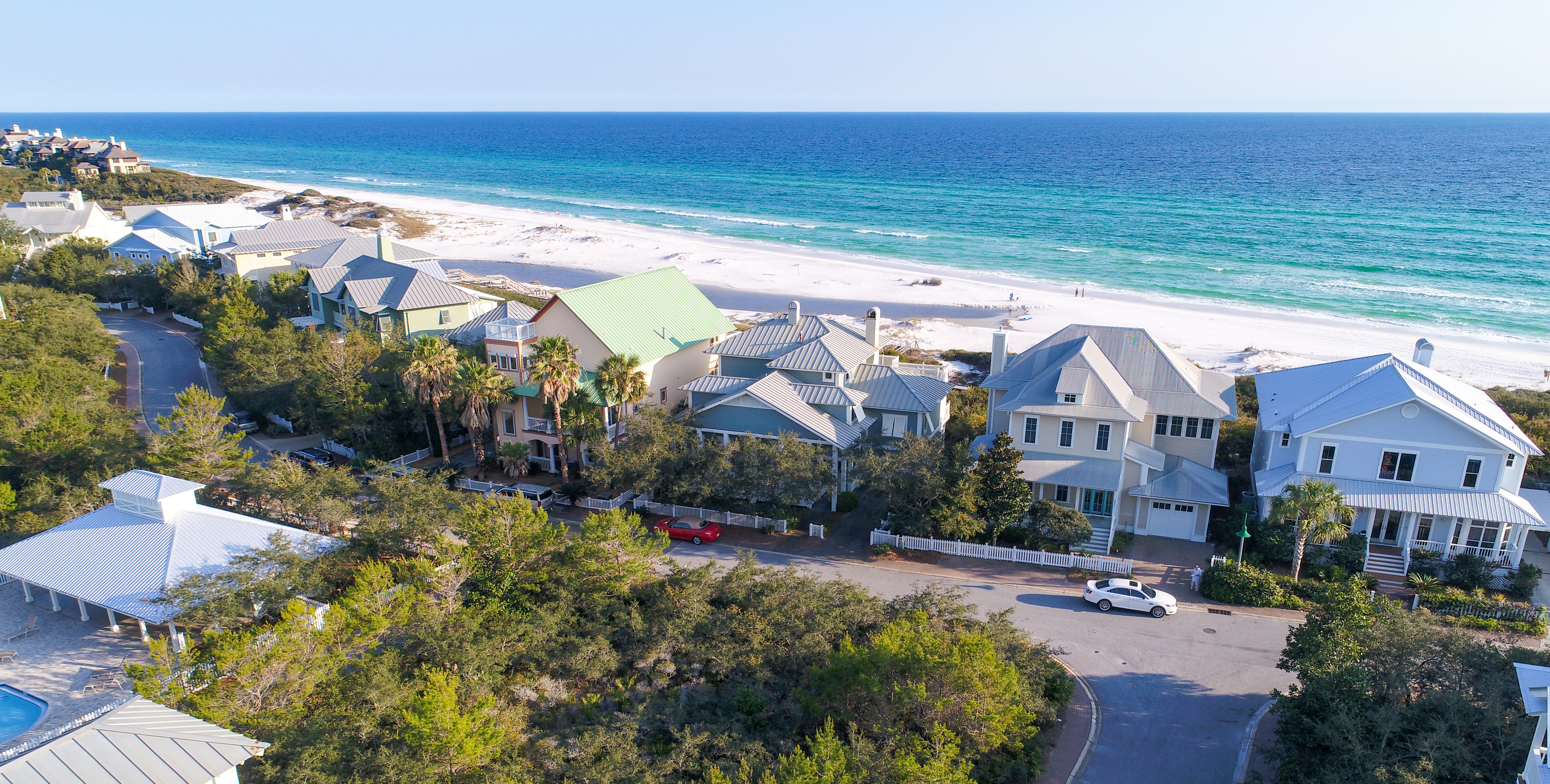 An aerial view of some of the Gulf front homes in Old Florida Beach with the gulf in the background